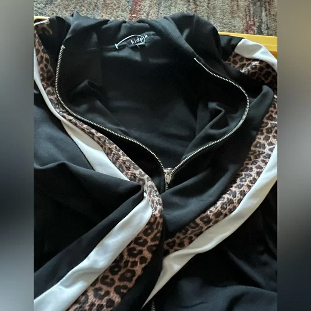 Kidpik track jacket with zipper closure front and leopard and stripe detailing